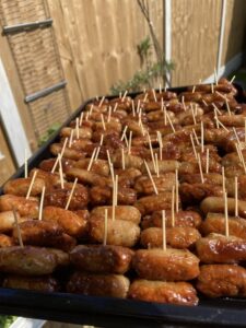 honey mustard mini sausages 1 mini sausages honey mustard dressing canape catering caterer party food corporate event wedding birthday funeral occasion anniversary retirement Crawley West Sussex Surrey Horsham Horley Brighton East Grinstead buffet