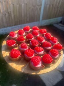 mini blackcurrant cheesecake in chocolate cups mini blackcurrant cheesecake in chocolate cups birthday mothers day catering buffet party food Crawley Horsham Horley Haywards Heath Copthorne homemade food West Sussex Surrey Brighton canape wedding